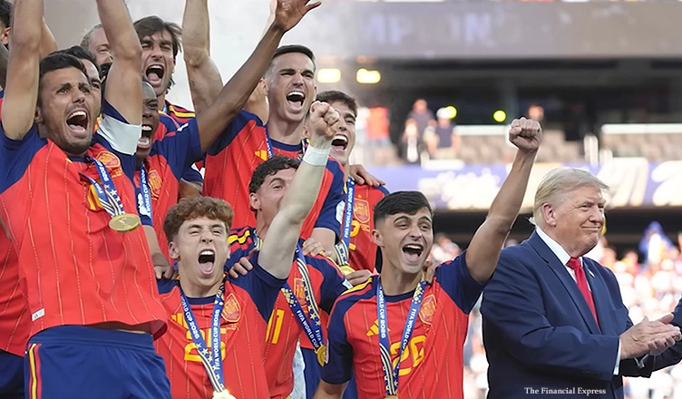President Donald Trump lingered on the stage with Spain's national football at the 2026 World Cup trophy ceremony team on Sunday, July 19, 2026. (Credit: YouTube/The Financial Express)